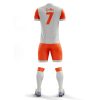 orange and white soccer kit